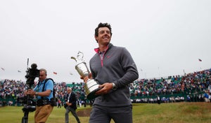 Rory McIlroy of Northern Ireland holds the Claret Jug after his two-stroke victory at The 143rd Open Championship at Royal Liverpool on July 20, 2014 in Hoylake, England.