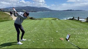 author hits shot on Pebble's 7th hole