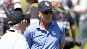 liv golf greg norman stands and talks