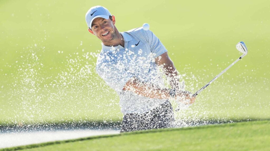 rory mcilroy hits out of bunker