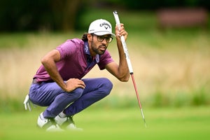 Akshay Bhatia of the United States lines up a putt on the third green during the second round of the Wyndham Championship at Sedgefield Country Club on August 04, 2023 in Greensboro, North Carolina.