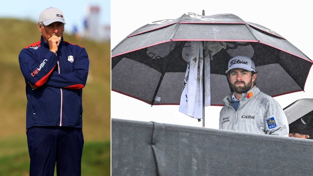 Cameron Young walks to the first tee under am umbrella during the final round of The 151st Open Championship at Royal Liverpool Golf Club on July 23, 2023 in Hoylake, England.