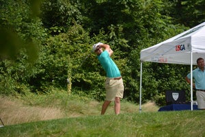 Jack Hirsh hits a drive during a U.S. Mid-Amateur qualifier.