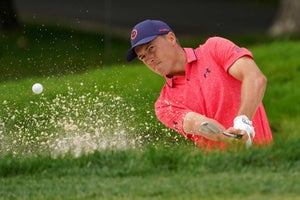 Jordan Spieth of the United States plays a shot from the bunker on the first hole during the third round of the BMW Championship at Olympia Fields Country Club on August 19, 2023 in Olympia Fields, Illinois.