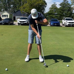 Practice with a long putter