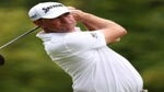 Lucas Glover of the United States plays his shot from the 14th tee during the final round of the Wyndham Championship at Sedgefield Country Club on August 06, 2023 in Greensboro, North Carolina.