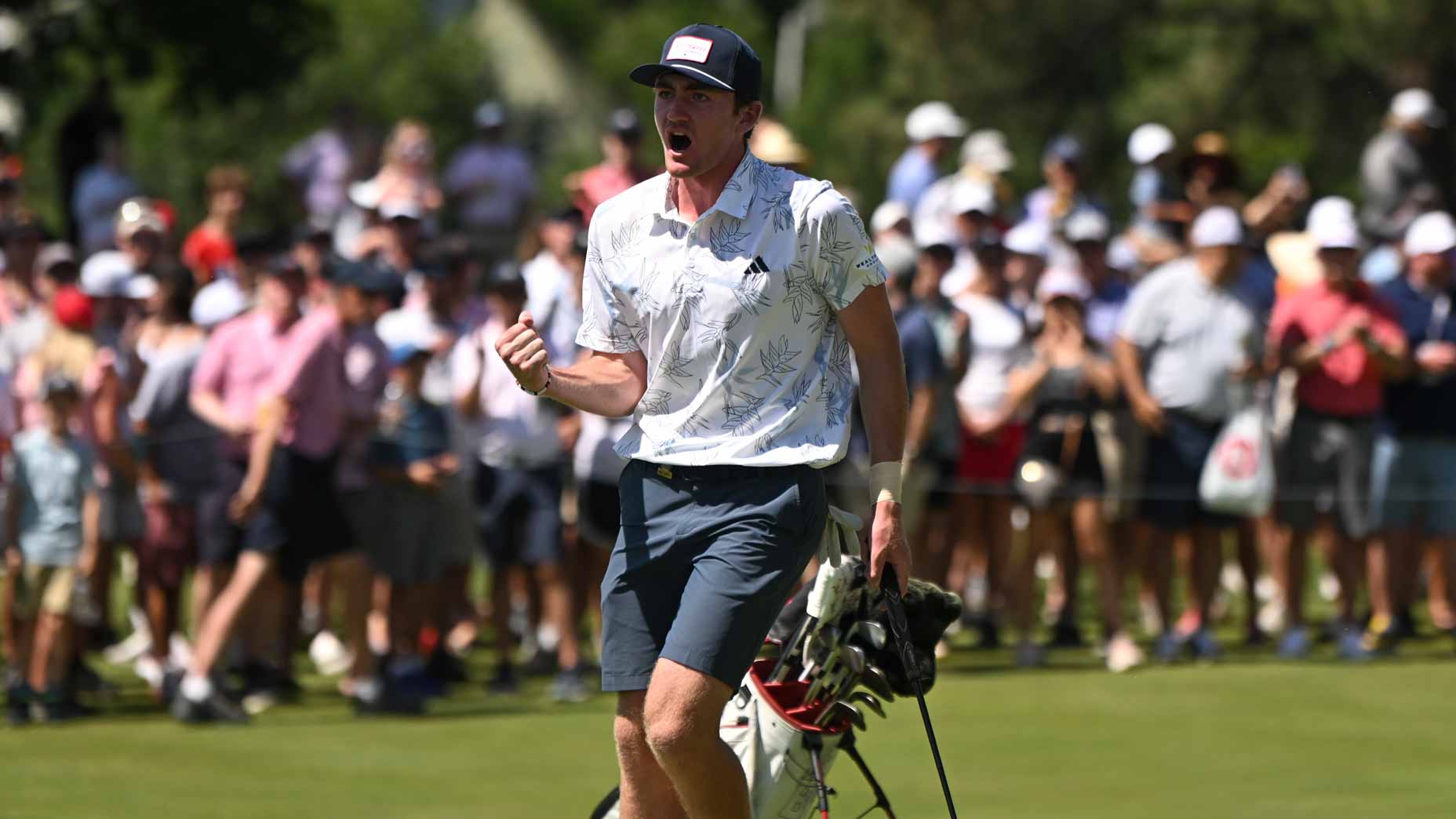 Nick Dunlap reacts to making a long putt on hole 27 during the final match of the 2023 U.S. Amateur at Cherry Hills C.C. in Cherry Hills Village, Colo. on Sunday, Aug. 20, 2023.