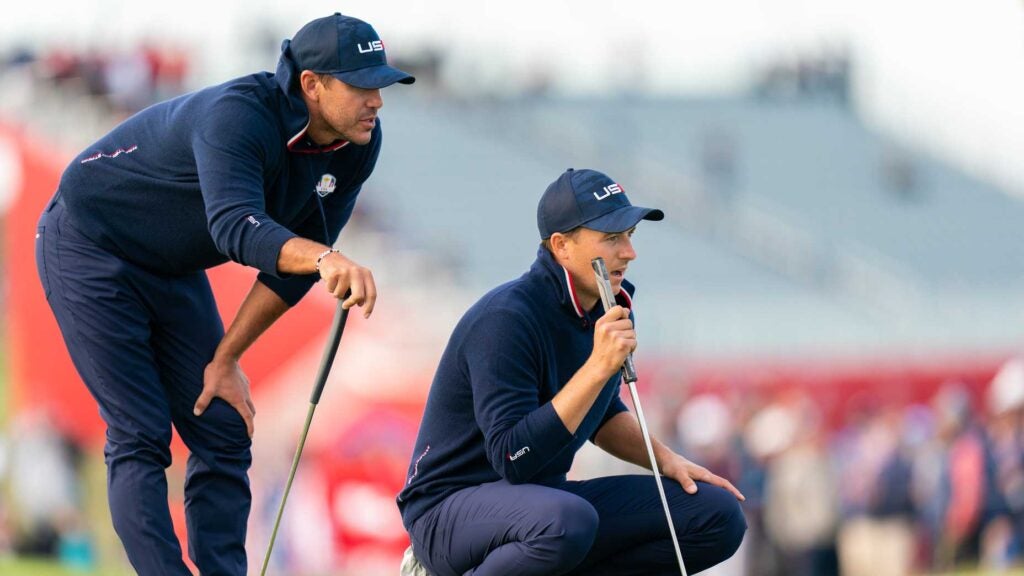 Brooks Koepka of team United States and Jordan Spieth of team United States on the 15th green during the PM Fourball Matches for the 2020 Ryder Cup at Whistling Straits on September 25, 2021 in Kohler, Wisconsin.