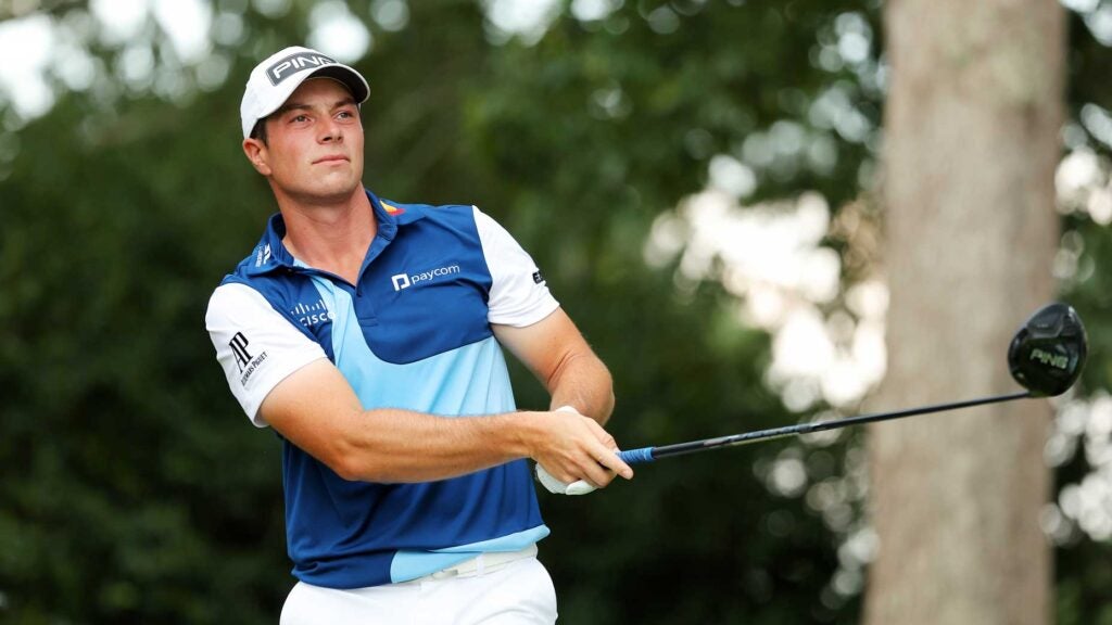 Viktor Hovland of Norway plays his shot from the seventh tee during the final round of the TOUR Championship at East Lake Golf Club on August 27, 2023 in Atlanta, Georgia.