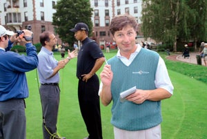 Brandel Chamblee, foreground, with a younger PGA Tour pro behind him.