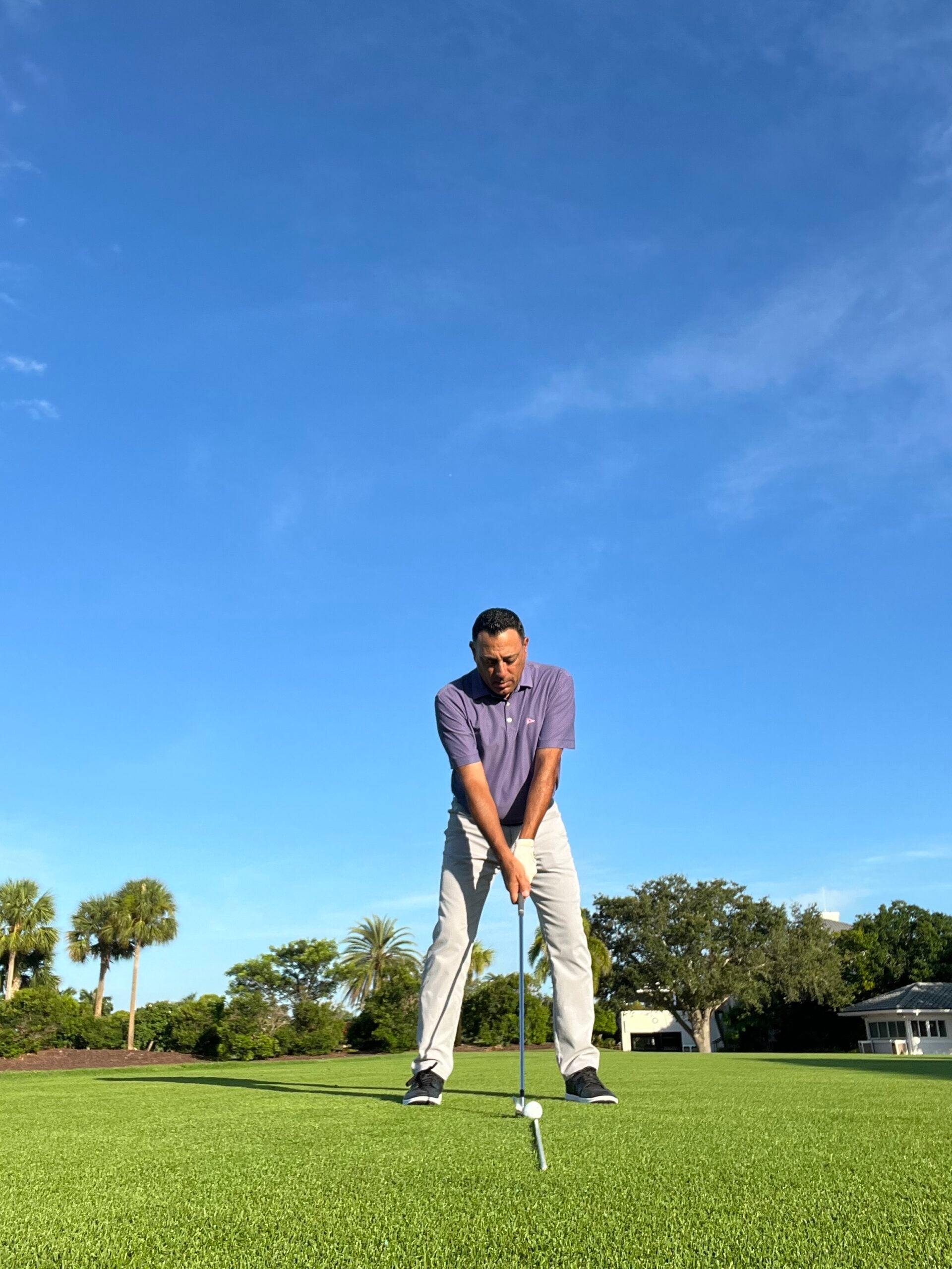 how to conquer golf impact mike malizia alignment stick scaled