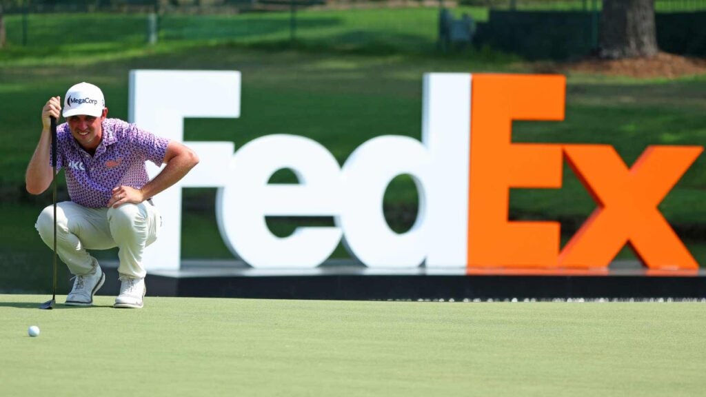 J.T. Poston lines up putt at FedEx Cup Playoff event