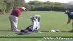 Phil Mickelson allegedly practicing the towel drill at the 2006 Masters with Dave Pelz looking on