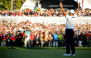 Martin Kaymer of Germany raises his hands in victory after sinking his putt on the 18th green to retain the Ryder Cup for the Europeans during the Singles Matches on the final day of play for the 39th Ryder Cup at Medinah Country Golf Club on September 30, 2012 in Medinah, Illinois.