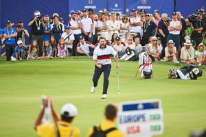 Patrick Cantlay of the U.S. Team celebrates with a fist pump after making a birdie putt on the 18th hole green during Saturday afternoon four-ball matches of the 2023 Ryder Cup at Marco Simone Golf Club on September 30, 2023 in Rome, Italy.