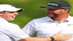 Michael Block (R) of the United States, PGA of America Club Professional, celebrates his hole-in-one on the 15th tee with Rory McIlroy (L) of Northern Ireland during the final round of the 2023 PGA Championship at Oak Hill Country Club on May 21, 2023 in Rochester, New York.
