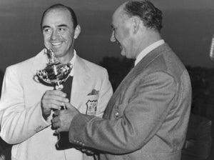 Captain Sam Snead, of the American team receives the coveted Ryder Cup for his team from Joe Novak (right), President of the Professional Golfers Association, at the Pinehurst, North Carolina, Country Club. The American squad defeated the British team, 9 1/2 points to 2 1/2 points, in the two-day competition for the cup. Britain has won only twice since 1927 and has not beaten the U.S. since 1933.