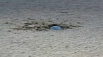 golf ball buried in the bunker