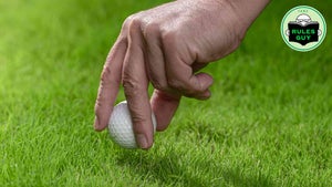 hand placing ball