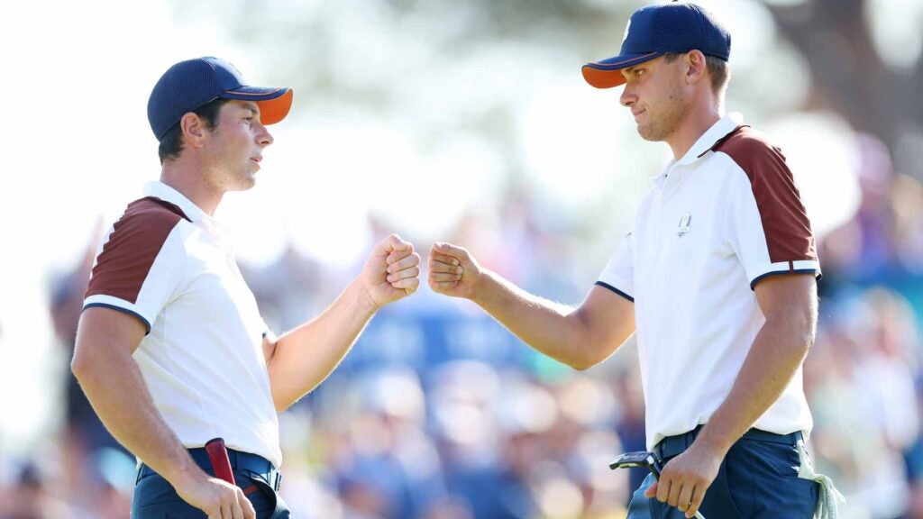 viktor hovland and ludvig aberg fist bump