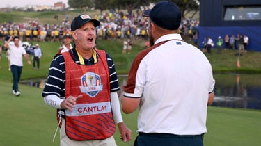 Caddie Joe LaCava and Shane Lowry exchange tense words on Saturday at the Ryder Cup