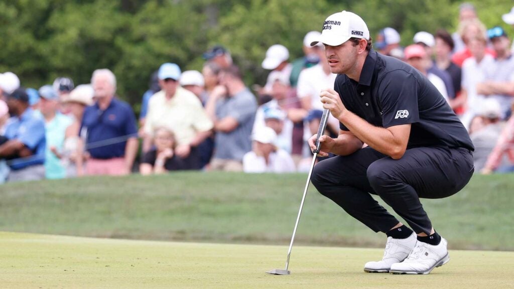 patrick cantlay reads a putt