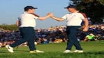 robert macintyre shakes hands with justin rose