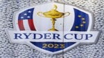 The 2023 Ryder Cup logo in front of golf balls