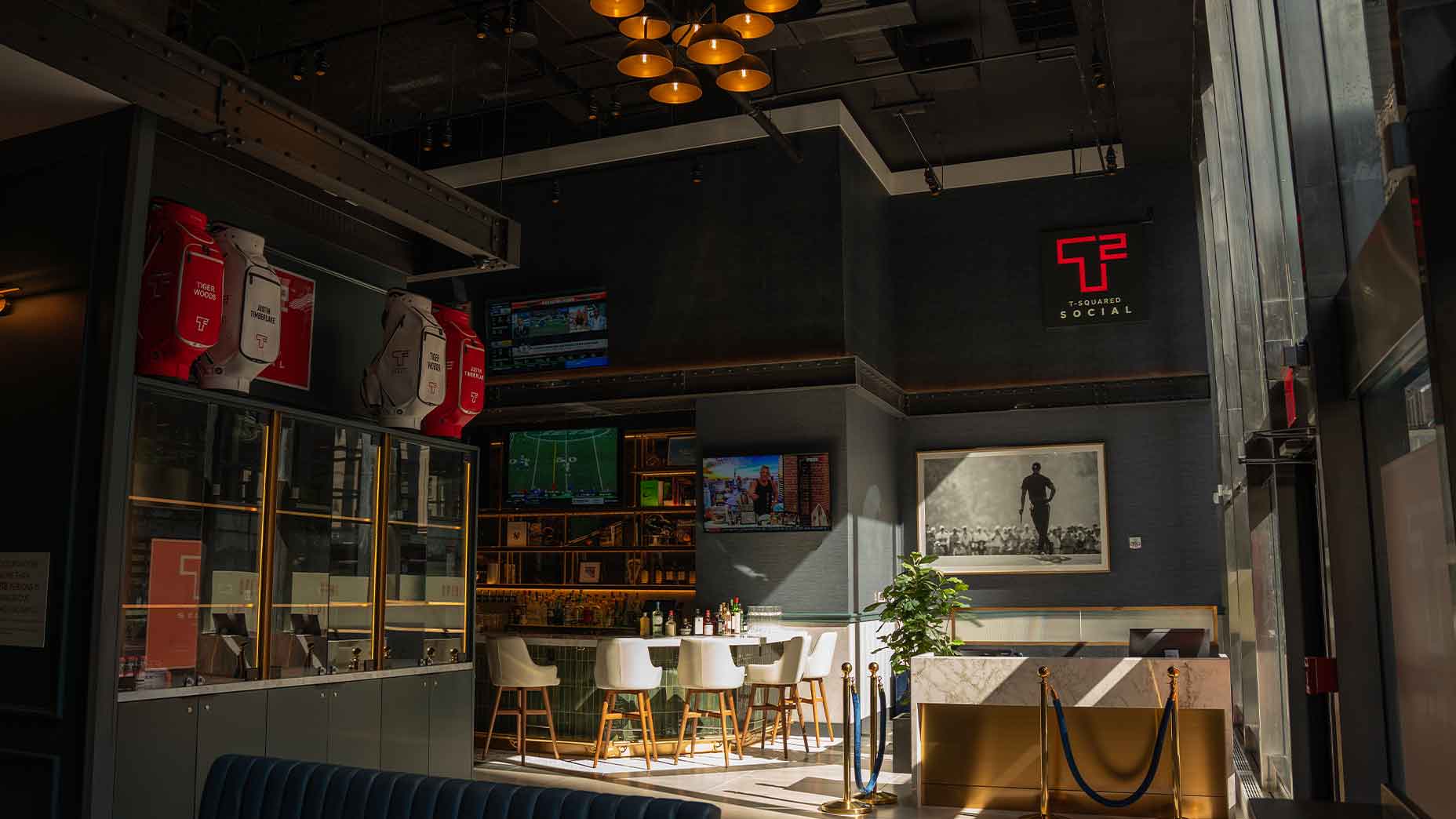 Tiger Woods, Justin Timberlake Tee Off Sports Bar in NYC