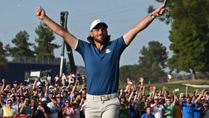 Europe’s English golfer, Tommy Fleetwood celebrates the winning putt on the 17th green during his singles match against US golfer, Rickie Fowler on the final day of play in the 44th Ryder Cup at the Marco Simone Golf and Country Club in Rome on October 1, 2023.