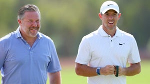 McLaren CEO Zak Brown and Rory McIlroy.