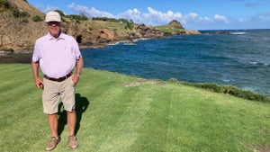 ben crenshaw poses in front of the 16th hole at Cabot St. Lucia