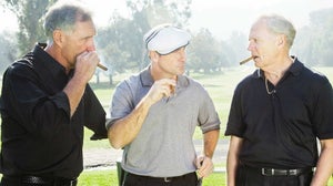 golfers with cigars on the course