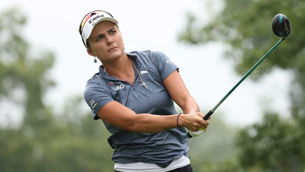 Lexi Thompson watches drive at LPGA event