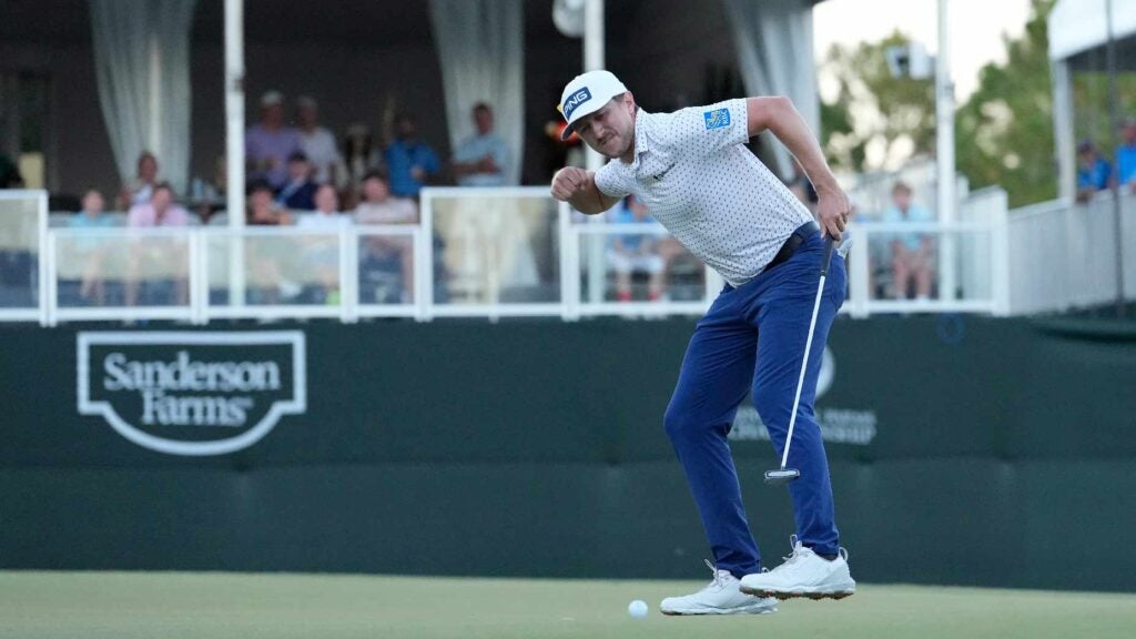 Mackeznie Hughes celebrates putt at 2022 Sanderson Farms Championship