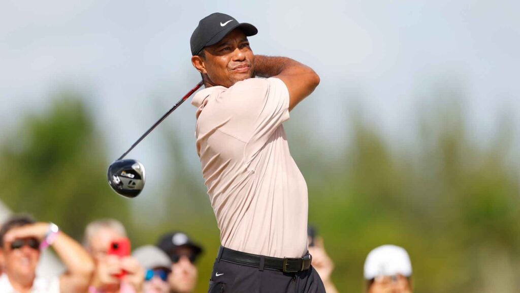 Tiger Woods of the United States plays his shot from the fourth tee during the first round of the Hero World Challenge at Albany Golf Course on November 30, 2023 in Nassau, Bahamas.