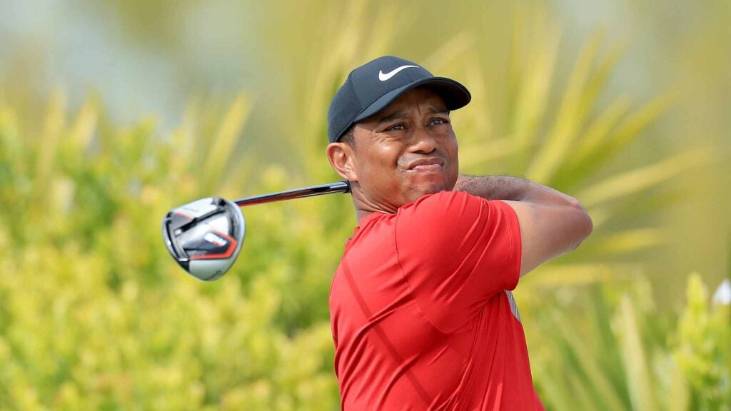 Tiger Woods swings a driver in the Bahamas