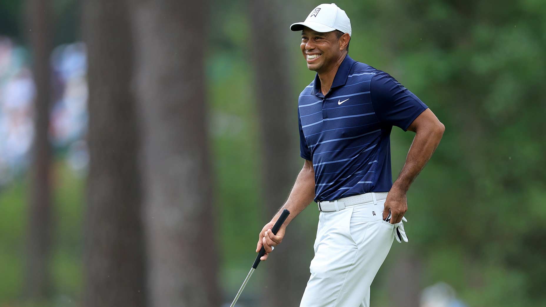 Tiger Woods smiles at the Masters.