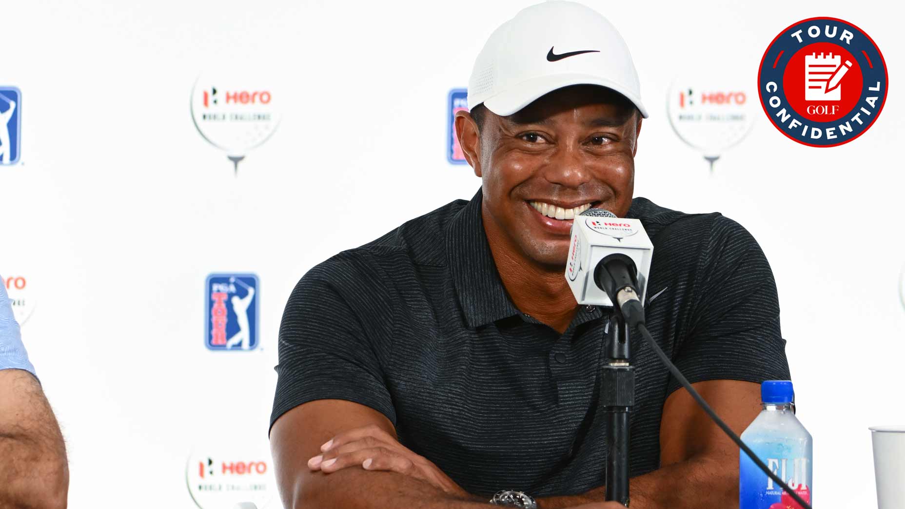 Tiger Woods smiles at a 2022 Hero World Challenge press conference.