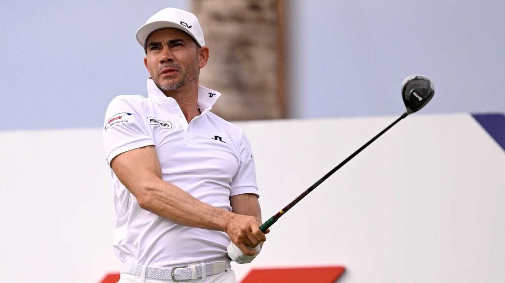 Camilo Villegas watches a tee shot