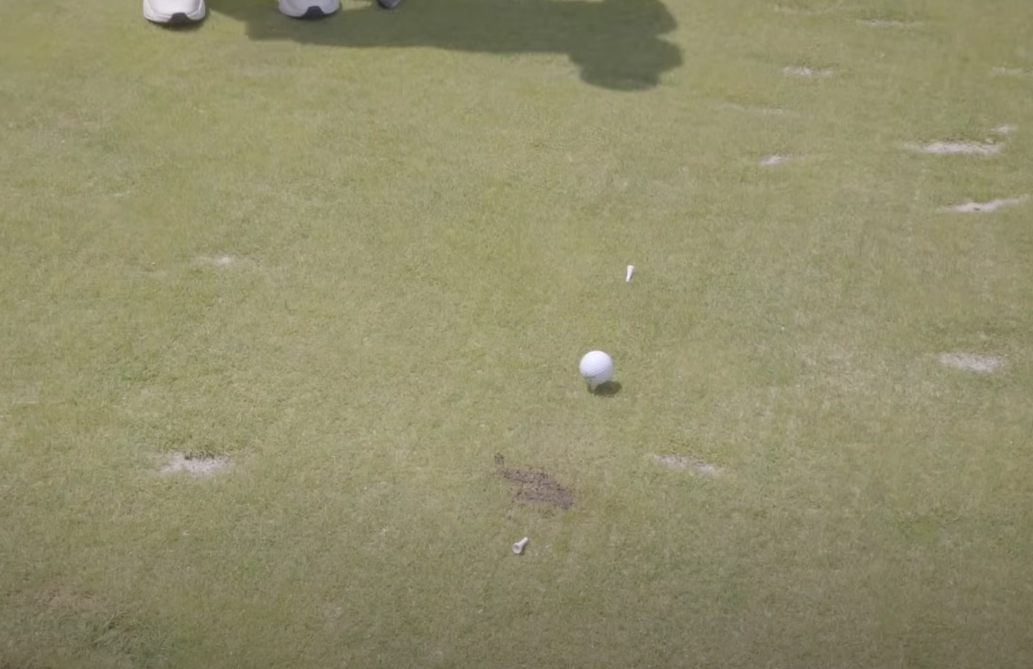 Use parts of a broken tee to make a finish line and improve clubface control