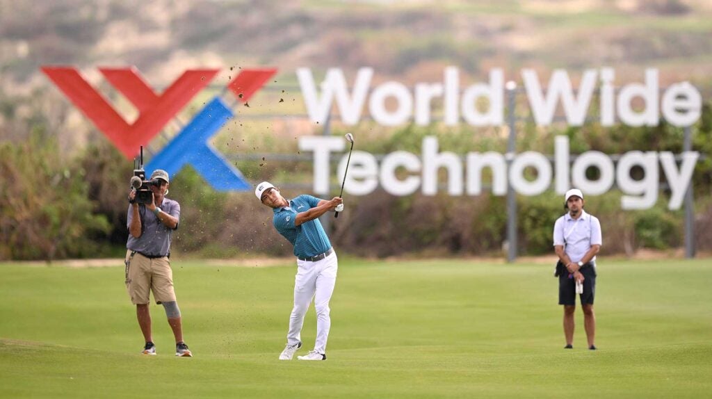 Justin Suh hits an approach shot during the third round of the World Wide Technology Championship on Saturday in Mexico.