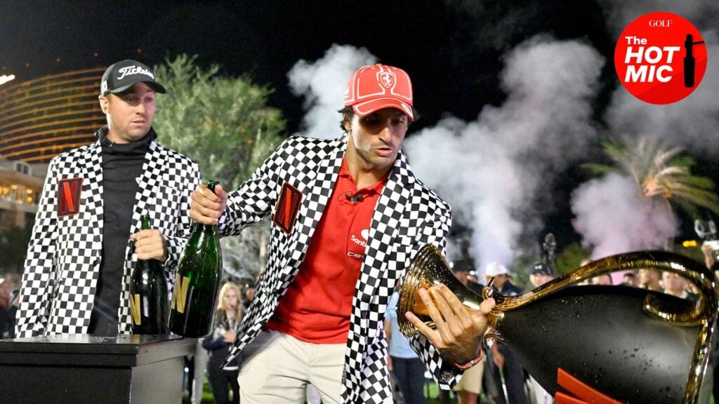 carlos sainz and justin thomas celebrate netflix cup victory in checkered jackets in Las Vegas.