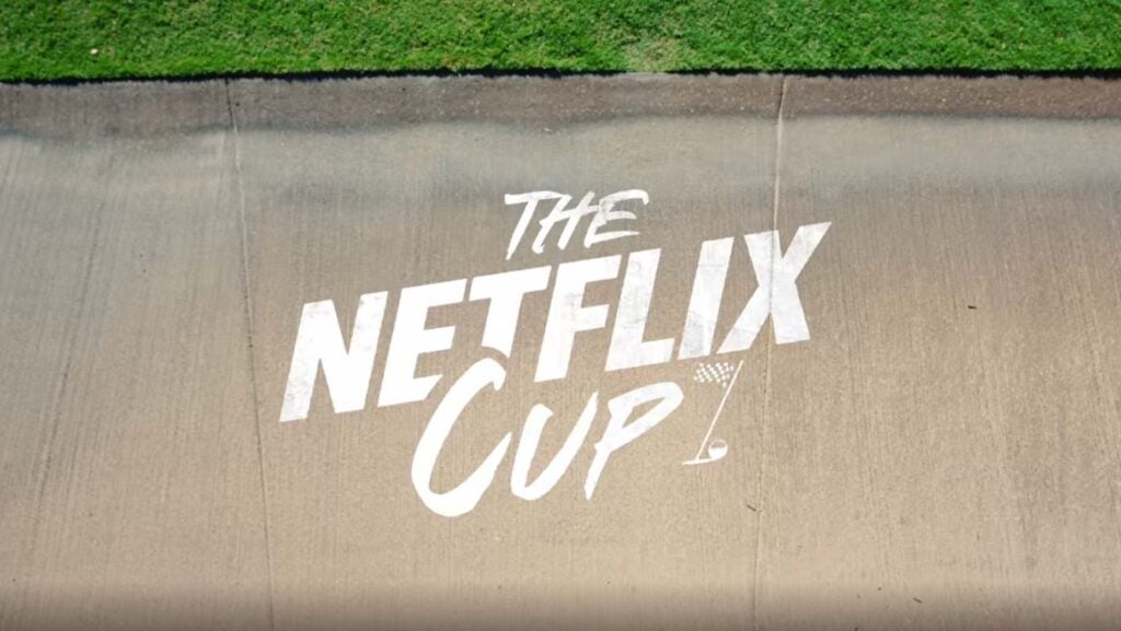 The Netflix Cup logo superimposed on golf cart path