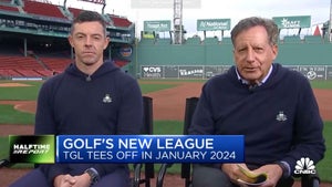 rory mcilroy and tom werner appear in tgl sweaters from fenway park