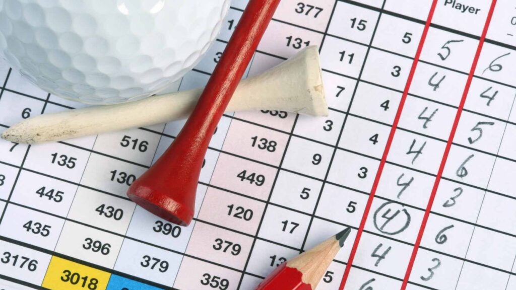 Golf scorecards with pencils and tees