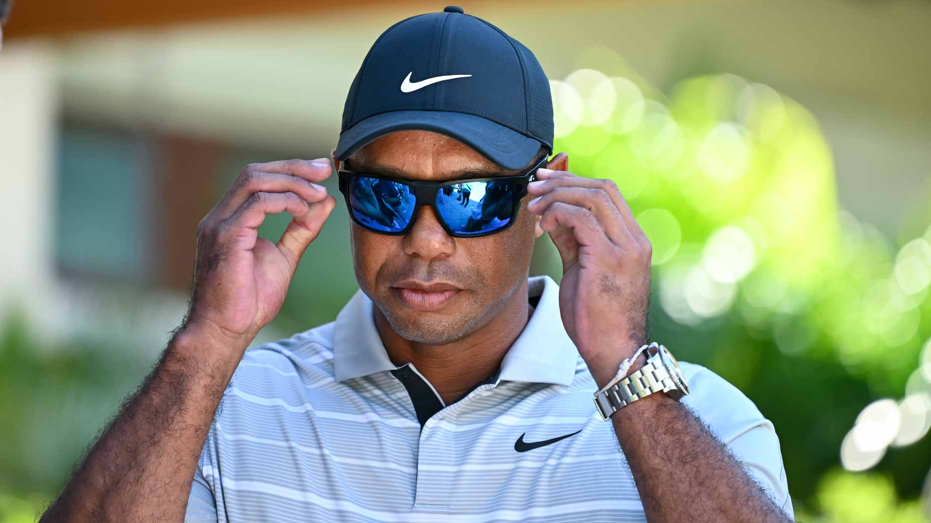 Tiger Woods puts on sunglasses after press conference at 2023 Hero World Challenge