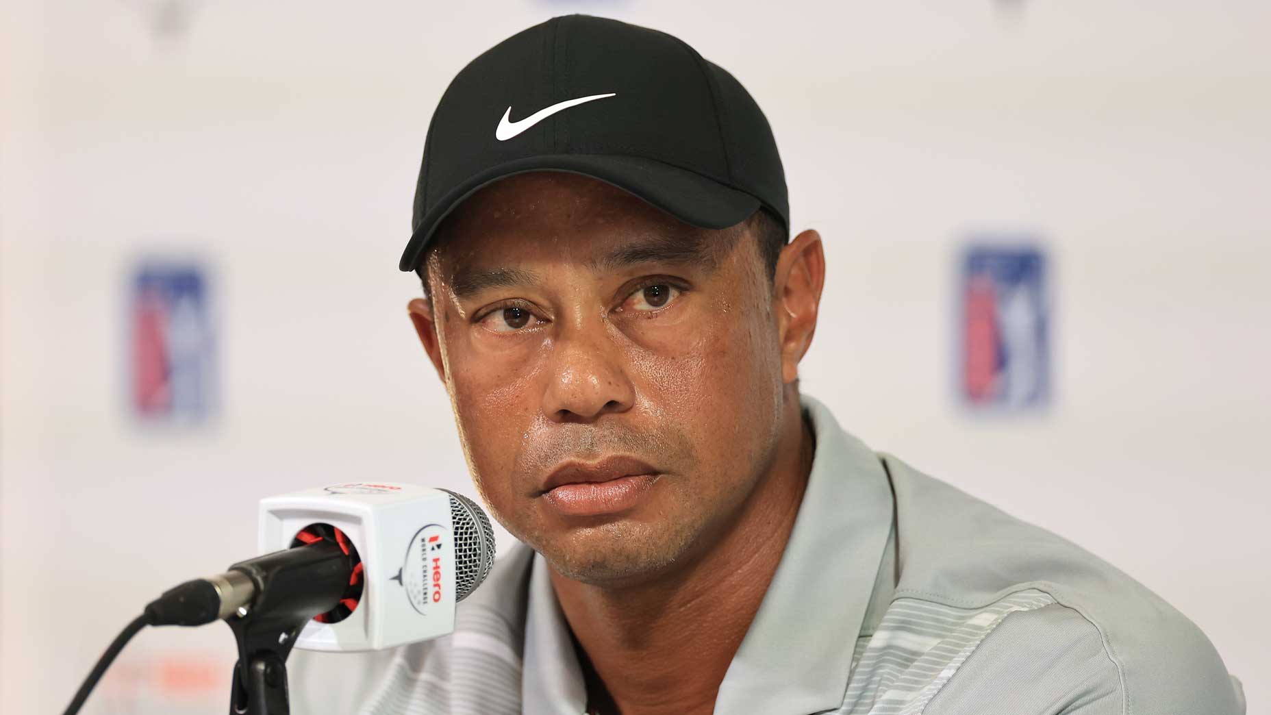 Tiger Woods speaks at press conference.