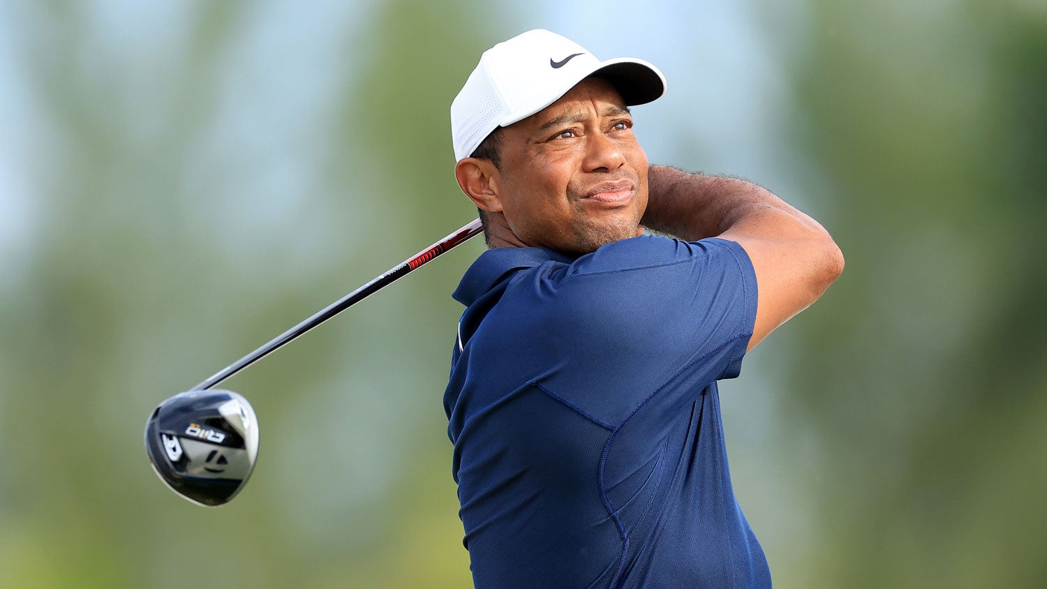 Tiger Woods plays a shot during the pro-am as a preview for the Hero World Challenge