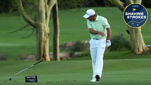 pro golfer throws club after hitting drive during tournament